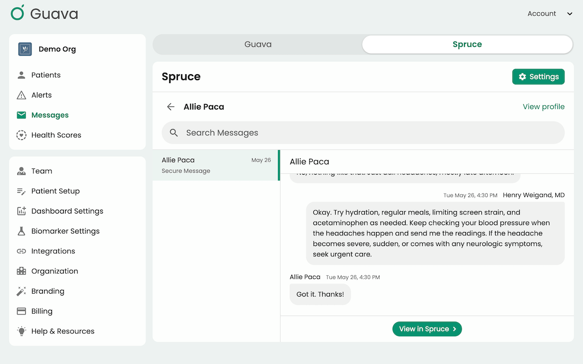 Guava's org-level Messages tab toggled to the Spruce view, listing patient conversations and an open thread with a View in Spruce button